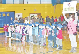 <p>At halftime of last month’s basketball game against Troy, the Graduation Matters group brought out this year’s kindergarteners, the Libby High School class of 2025, to show that kids should think about graduating even when they are young.</p>