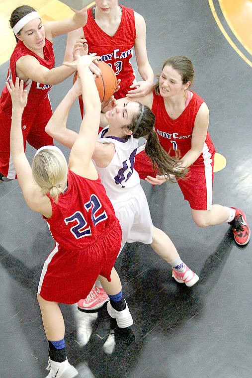 <p>A host of Superior girls stuff Shayna Nagy's shot in the Lady Bobcats' season-ending loss to Charlo.</p>