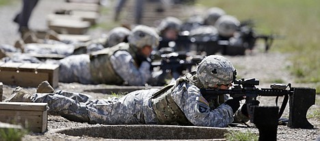 &lt;p&gt;This Sept. 18, 2012, photo shows female soldiers training on a firing range while wearing new body armor in Fort Campbell, Ky.&lt;/p&gt;