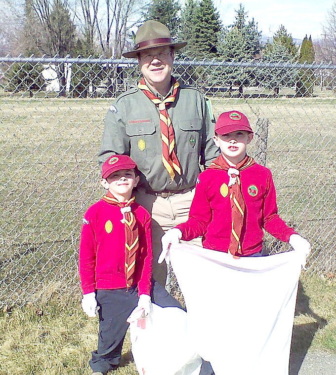 &lt;p&gt;Logan Thiele, Frank McKinney and Tyler Thiele work on a cleanup project along a bike path in Missoula for their Baden-Powell Service Association scout group. McKinney is the scout leader for a new branch of the organization in Alberton.&lt;/p&gt;