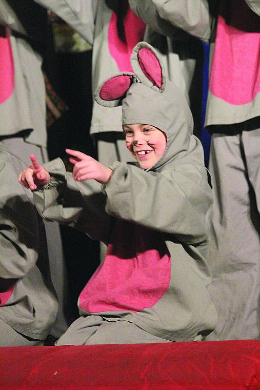 &lt;p&gt;Elanore &#145;Ellie&#146; Faye Buffo&#160;is all smiles during one of the musical numbers of the Missoula Children's Theater production of &lt;em&gt;Cinderella&lt;/em&gt; Friday afternoon in Hot Springs.&lt;/p&gt;