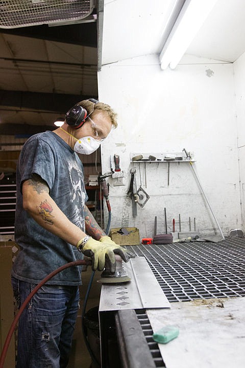 &lt;p&gt;Chuck Lupton, cosmetic grinder, preps aluminum panels for the USA Center of Military History Museum Division project at Heater Craft.&lt;/p&gt;