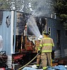 Fire destroys trailer home in Columbia Falls