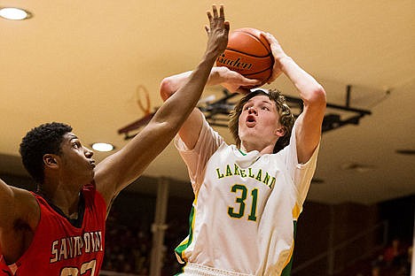 &lt;p&gt;Lakeland High School&#146;s Jay Plunkett puts up a third quarter jump shot over Sandpoint&#146;s Carlos Collado.&lt;/p&gt;