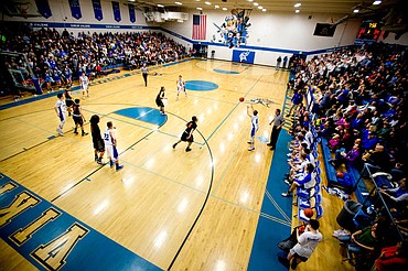 <p>The Coeur d'Alene High School gym is packed with fans from both teams at the 5A Region 1 second-place game on Thursday, Feb. 25, 2016 at Coeur d'Alene High School. Post Falls defeated Coeur d'Alene 77-70.</p>