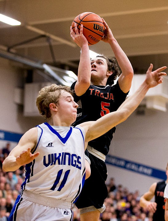 &lt;p&gt;Post Falls' Max McCullough soars to the basket past Coeur d'Alene's Jakob Lynn at the 5A Region 1 second-place game on Thursday, Feb. 25, 2016 at Coeur d'Alene High School. Post Falls defeated Coeur d'Alene 77-70.&lt;/p&gt;