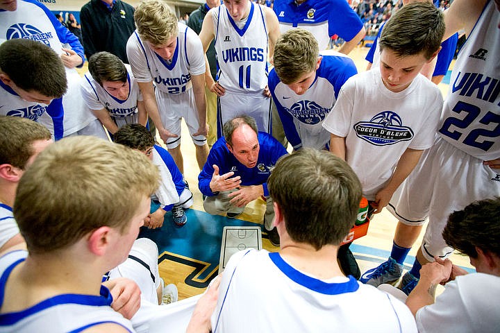 &lt;p&gt;Coeur d'Alene head coach Kurt Lundblad consults his team during a timeout in the third quarter at the 5A Region 1 second-place game on Thursday, Feb. 25, 2016 at Coeur d'Alene High School. Post Falls defeated Coeur d'Alene 77-70.&lt;/p&gt;