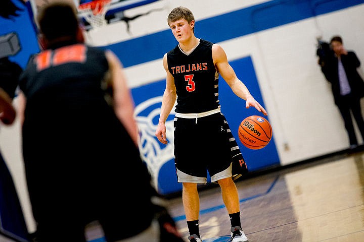 &lt;p&gt;Post Falls' Wyatt Millsap waits for a play to develop at the 5A Region 1 second-place game on Thursday, Feb. 25, 2016 at Coeur d'Alene High School. Post Falls defeated Coeur d'Alene 77-70.&lt;/p&gt;