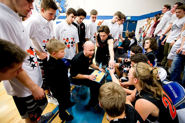 &lt;p&gt;Post Falls' head coach Mike McLean gets his team fired up before the start of the fourth quarter at the 5A Region 1 second-place game on Thursday, Feb. 25, 2016 at Coeur d'Alene High School. Post Falls defeated Coeur d'Alene 77-70.&lt;/p&gt;