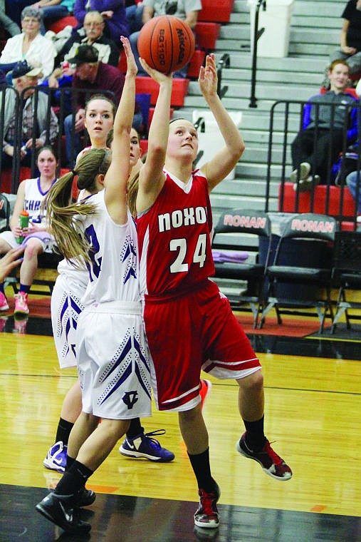 &lt;p&gt;Noxon's Jenna Langdon uses her position to convert an easy layup in Thursday's loss to Charlo.&lt;/p&gt;