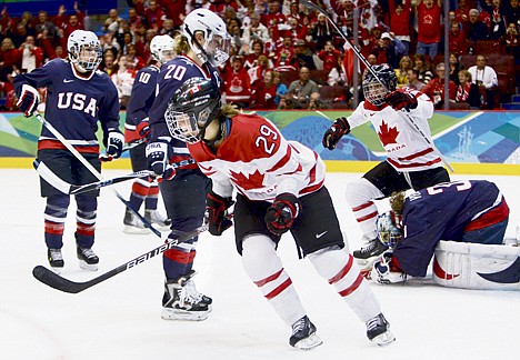 &lt;p&gt;Canada's forward Marie-Philip Poulin (29) celebrates after scoring her second goal of the game against USA goalie Jessie Vetter, right, in the first period of the women's gold medal ice hockey game at the Vancouver 2010 Olympics in Vancouver, British Columbia, Thursday, Feb. 25, 2010. (AP Photo/Gene J. Puskar)&lt;/p&gt;