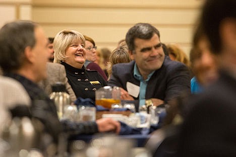 &lt;p&gt;Cindy Winslow of Century 21 realty, laughs at Hammond's opening joke during the Real Estate Market Forum.&lt;/p&gt;