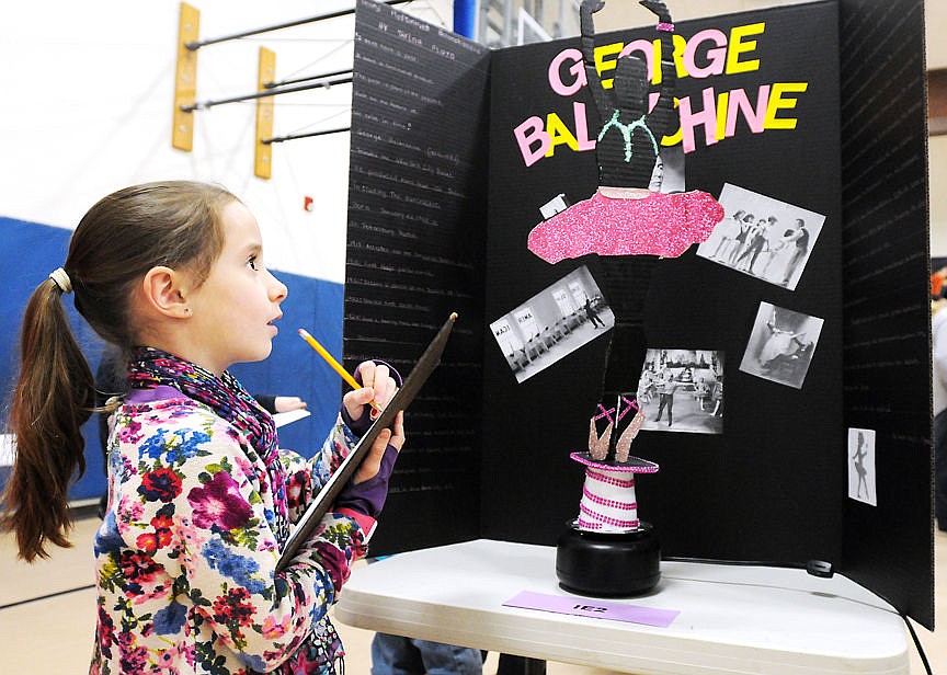 &lt;p&gt;Bigfork third-grader Tinley Ernhart observes Taylor Floyd&#146;s exhibit on George Balanchine during the National History Day Fair at Bigfork Middle School on Wednesday. The eighth-grader chose the father of the American Ballet and co-founder of the School of American Ballet because she&#146;s a ballerina. &#147;Ballet fascinates me,&#148; Floyd said. (Aaric Bryan photos/Daily Inter Lake)&lt;/p&gt;