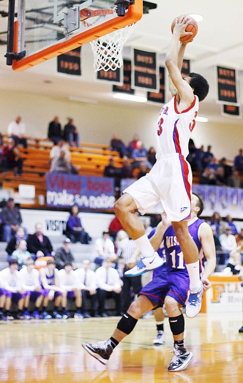 &lt;p&gt;Bigfork junior forward Christian Evans goes up for a dunk during the Vikings victory over St. Ignatius on Thursday morning during the second round of the Western B Divisional Tournament at Flathead High School. Thursday, Feb. 21, 2013 in Kalispell, Montana. (Patrick Cote/Daily Inter Lake)&lt;/p&gt;