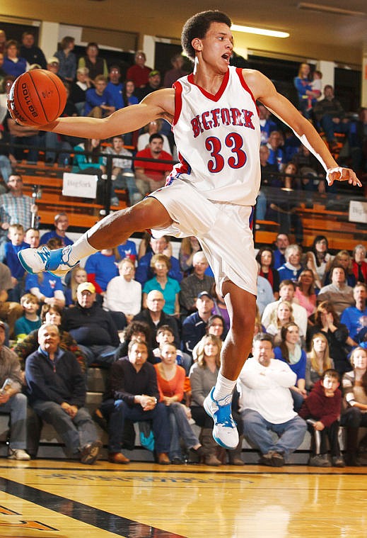 &lt;p&gt;Bigfork junior Christian Evans (33) attempts to save a near the baseline Saturday night during Bigfork's loss to Florence in the championship game of the Western B Divisional Tournament at Flathead High School. Saturday, Feb. 23, 2013 in Kalispell, Montana. (Patrick Cote/Daily Inter Lake)&lt;/p&gt;