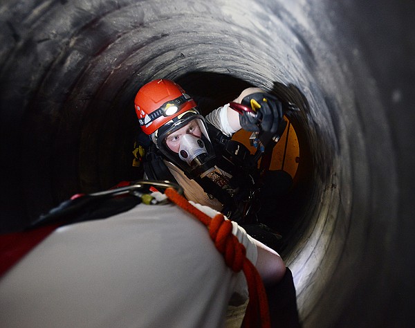 &lt;p&gt;Eric Huleatt of the Missoula Rural Fire Department works to rescue an&#160;unconscious victim from a tunnel as part of the four-day Confined Space Rescue School Feb. 16 at the Kalispell North Fire Station.&lt;/p&gt;