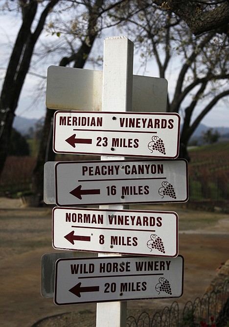 &lt;p&gt;In this photo taken Tuesday, Feb. 2, 2010, signs pointing to other wineries are shown outside the tasting room at Justin Vineyards and Winery in Paso Robles, Calif. Located on California's Central Coast, the Paso Robles viticultural area's consistent quality and relatively moderate land prices have combined for phenomenal growth. (AP Photo/Eric Risberg)&lt;/p&gt;