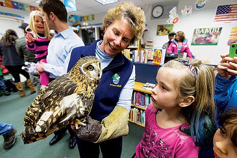 &lt;p&gt;Beth Paragamian, wildlife education specialist for the Idaho Fish and Game and Bureau of Land Management departments, displays a short-eared owl named Barb to London Lynch, a first grader at Fernan Elementary School.&lt;/p&gt;