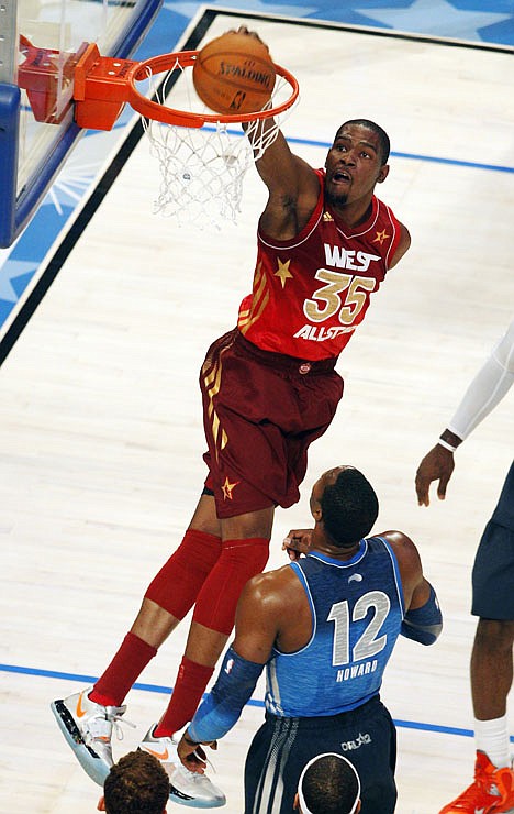 &lt;p&gt;Western Conference's Kevin Durant (35), of the Oklahoma City Thunder, dunks over Eastern Conference's Dwight Howard (12), of the Orlando Magic, during the first half of the NBA All-Star basketball game, Sunday, Feb. 26, 2012, in Orlando, Fla. (AP Photo/Lynne Sladky)&lt;/p&gt;