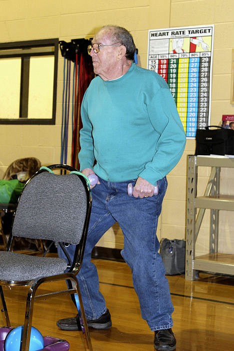 &lt;p&gt;Robert Thompson exercises during the Silver Sneakers class at the Family YMCA of Northwest Illinois in Freeport, Ill., Jan. 26.&lt;/p&gt;