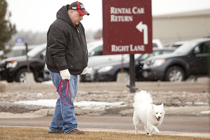 &lt;p&gt;George Vincent walks his service dog Vanilla outside of Glacier Park International Airport Friday afternoon.&lt;/p&gt;