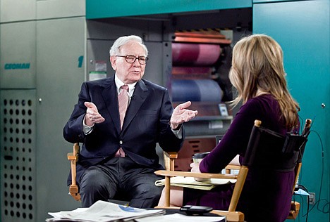 &lt;p&gt;Billionaire inverstor Warren Buffett chairman and CEO of Berkshire Hathaway, is interviewed by Becky Quick, co-host of CNBC's &quot;Squawk Box,&quot; on the floor of the Omaha World-Herald's press room Monay Feb. 27, 2012, in Omaha Neb. Buffett said Monday that stocks remain relatively cheap compared to other investments as the economy continues to improve. He also said that the company he heads is prepared to replace him whenever the need arises. (AP Photo/The Omaha World-Herald, Jeff Beiermann) ALL TV OUT, MAGS OUT&lt;/p&gt;