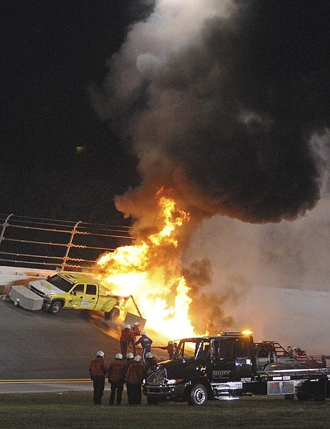 &lt;p&gt;Emergency workers try to extinguish a fire on a jet dryer during the NASCAR Daytona 500 auto race at Daytona International Speedway in Daytona Beach, Fla., Monday, Feb. 27, 2012. Juan Pablo Montoya's car struck the dryer during a caution period after something on his car broke. (AP Photo/Rob Sweeten)&lt;/p&gt;