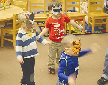 &lt;p&gt;Jack Huffine, tiger, Mason Alexander, horse, and Zavier Innerbichler, cat, act out animal movements during Story Time at North Lake County Public Library in Polson last Thursday.&lt;/p&gt;