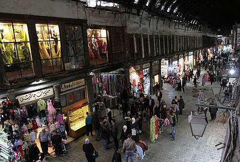 &lt;p&gt;AP Photo/Bassem Tellawi People walk through Hamidiya popular market in Damascus, Syria, on Tuesday. A capital that once prided itself as being one of the safest in the world is now a grim, tense place. Blast walls ring government buildings to protect from potential car bombs. Shops and restaurants close early. Residents struggle with spiraling prices and long electricity outages.&lt;/p&gt;