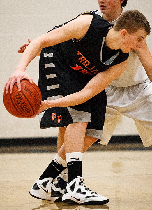 &lt;p&gt;SHAWN GUST/Press Luke Thoreson keeps the ball away from a defender while looking for a passing outlet.&lt;/p&gt;