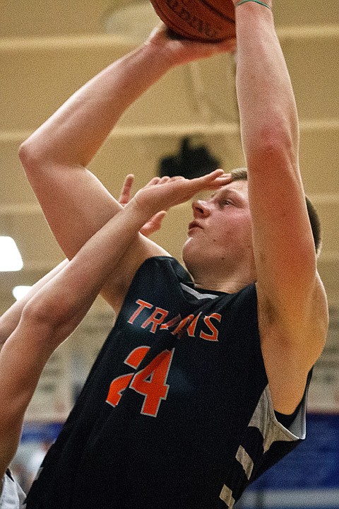 &lt;p&gt;SHAWN GUST/Press Michael Hillman takes a jump shot over the head of a defender.&lt;/p&gt;