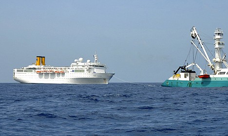 &lt;p&gt;RETRANSMISSION TO PROVIDE ALTERNATIVE CROP - In this photo taken by a member of French fishing vessel, The Talenduic, and provided by the Prefecture of the Reunion Island, shows the Italian cruise ship, The Costa Allegra, left, being towed by French fishing vessel, The Trevignon, in the Indian Ocean, Tuesday, Feb. 28, 2012. The French fishing vessel The Trevignon on Tuesday began towing an Italian cruise ship drifting powerless in the Indian Ocean to a nearby Seychelles island, but was not expected to reach the tiny resort island until Wednesday, officials said. Seychelles authorities said they are making arrangements to evacuate people to the island of Desroches and then to transfer the more than 1,000 passengers and crew members to the main Seychelles island of Mahe by plane and fast boats. (AP Photo/Le Talenduic, Reunion Island Prefecture, HO)&lt;/p&gt;