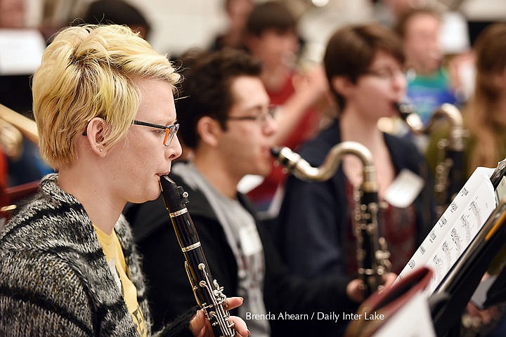 &lt;p&gt;&lt;strong&gt;From left&lt;/strong&gt;, Chandler Middlemas of the Flathead High School Symphonic Band and Steeton Wilsonoff and Rachel Schubert of the Hellgate High School Wind Ensemble practice under the direction of Nathan Stark of Montana State University on Monday at Flathead High School. (Brenda Ahearn/Daily Inter Lake)&lt;/p&gt;