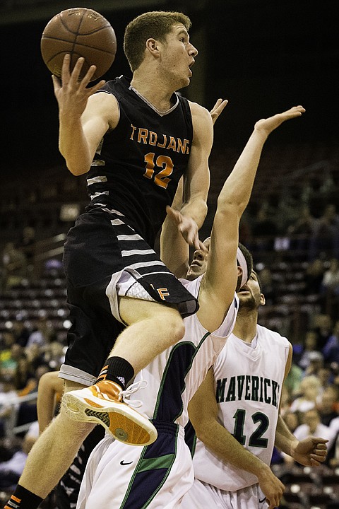 &lt;p&gt;SHAWN GUST/Press Tim Mueller takes the ball to the hoop Thursday during the state 5A boys basketball tournament at the Idaho Center in Nampa.&lt;/p&gt;