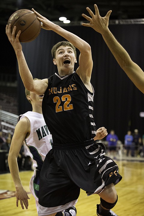 &lt;p&gt;SHAWN GUST/Press The Trojans' Dalton Thompson drives to the hoop in the first half.&lt;/p&gt;