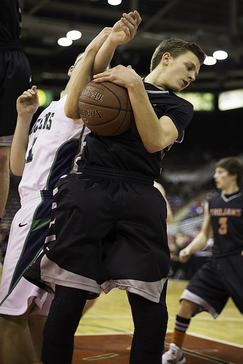 &lt;p&gt;SHAWN GUST/Press Matt Hillman comes down with the rebound Thursday during the state 5A boys basketball tournament at the Idaho Center in Nampa.&lt;/p&gt;