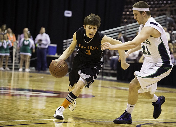 &lt;p&gt;SHAWN GUST/Press Post Falls High's Michael McKeown dribbles past Mountain View defender Randall Robinson Thursday during the state 5A boys basketball tournament at the Idaho Center in Nampa.&lt;/p&gt;