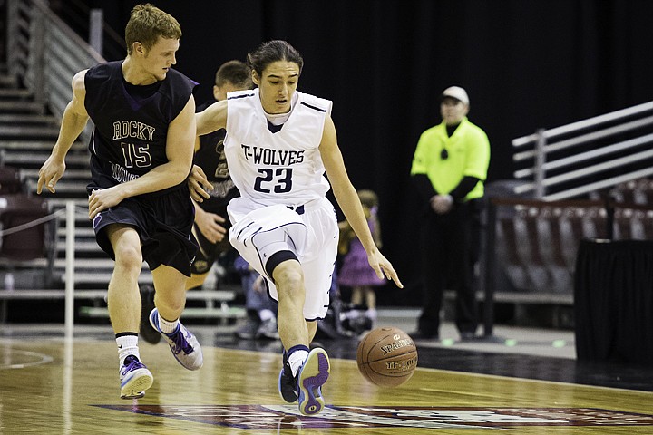 &lt;p&gt;SHAWN GUST/Press Tucker Louie-McGee dribbles the ball down court against Rocky Mountain High School's John Sherle during the state 5A boys basketball tournament at the Idaho Center in Nampa.&lt;/p&gt;