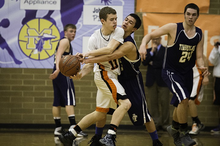 &lt;p&gt;SHAWN GUST/Press Timberlake's Austin Allen puts pressure on Fruitland High School's Taylor Mahler during the state 3A boys basketball tournament in Meridian.&lt;/p&gt;