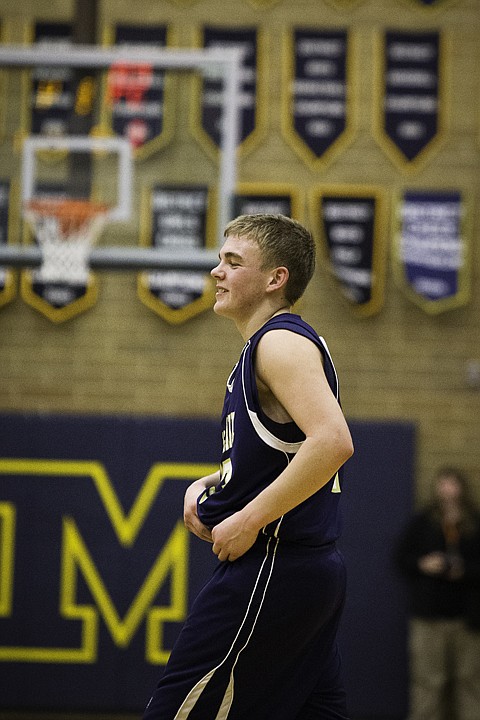 &lt;p&gt;SHAWN GUST/Press Timberlake's Johnny Hayden reacts after making a three-point shot at the buzzer against Fruitland during the state 3A boys basketball tournament in Meridian.&lt;/p&gt;