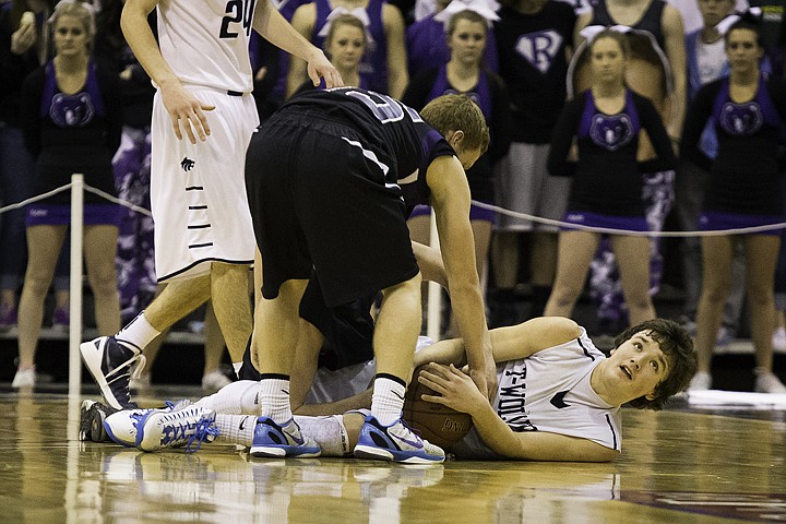 &lt;p&gt;SHAWN GUST/Press Justin Pratt looks up from the floor after a scramble that resulted in a jump ball Thursday during second half against Rocky Mountain in the first round of the state 5A boys basketball tournament at the Idaho Center in Nampa.&lt;/p&gt;