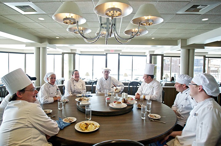 &lt;p&gt;JEROME A. POLLOS/Press A group of chefs and cooks discuss the new amenities of the remodeled Dockside Restaurant during a training session Tuesday in preparation for the reopening of the eatery in The Coeur d'Alene Resort.&lt;/p&gt;