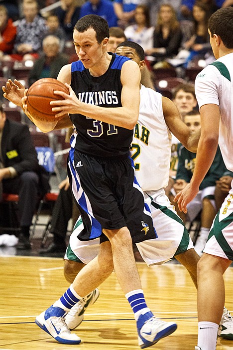 &lt;p&gt;The Vikings' Ty Higbie receives a pass during the first half against Borah.&lt;/p&gt;