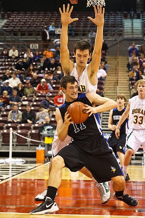 &lt;p&gt;Vikings forward Chad Chalich puts his weight into Borah's Brock Holubetz before making a move to the basket in the second half.&lt;/p&gt;