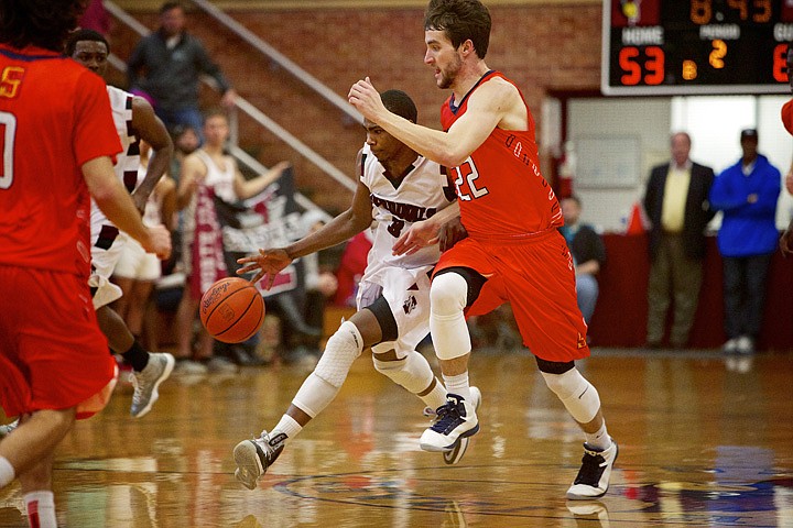 &lt;p&gt;JEROME A. POLLOS/Press North Idaho College's Jalil Abdul-Bassit attempts to speed past Connor Van Brocklin from Snow College.&lt;/p&gt;