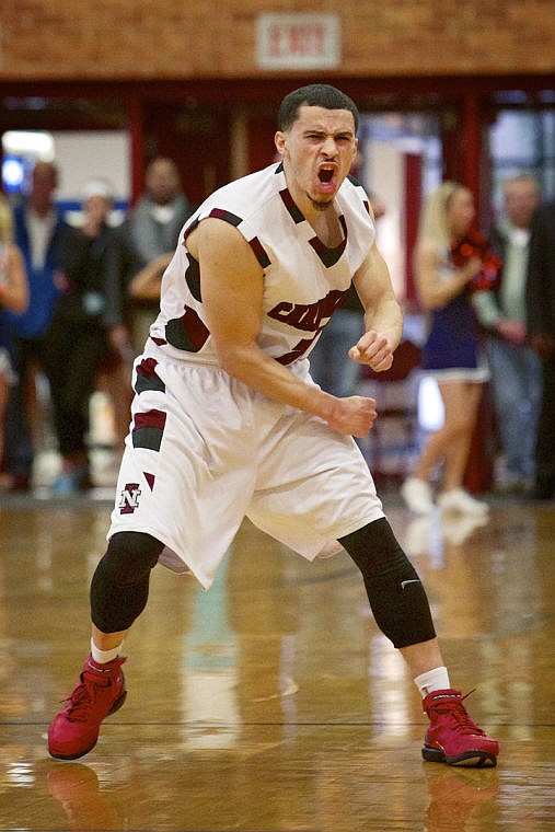 &lt;p&gt;JEROME A. POLLOS/Press North Idaho College's Mikey Hope reacts to sinking a three-point shot to bring the Cardinals within one point of Snow College in the final minute of the game Friday.&lt;/p&gt;