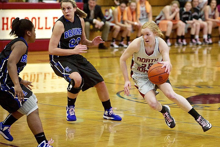 &lt;p&gt;JEROME A. POLLOS/Press North Idaho College's Aimee Durbidge cuts to her right after seeing an opening to the rim between to Snow College defenders.&lt;/p&gt;