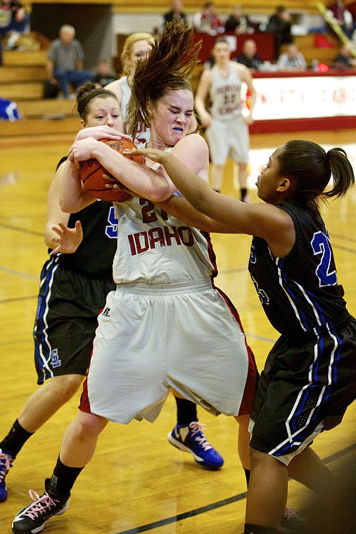 &lt;p&gt;JEROME A. POLLOS/Press Kabri Emerson from North Idaho College fights for the ball between to Snow College players.&lt;/p&gt;