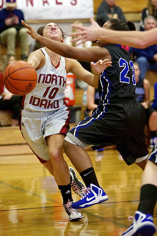 &lt;p&gt;JEROME A. POLLOS/Press North Idaho College's Katie Buskey gets fouled as she drives the baseline.&lt;/p&gt;