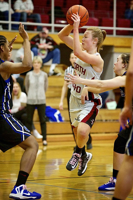 &lt;p&gt;JEROME A. POLLOS/Press North Idaho College's Georgia Stirton looks to make a pass under the hoop as she makes her way into the key.&lt;/p&gt;